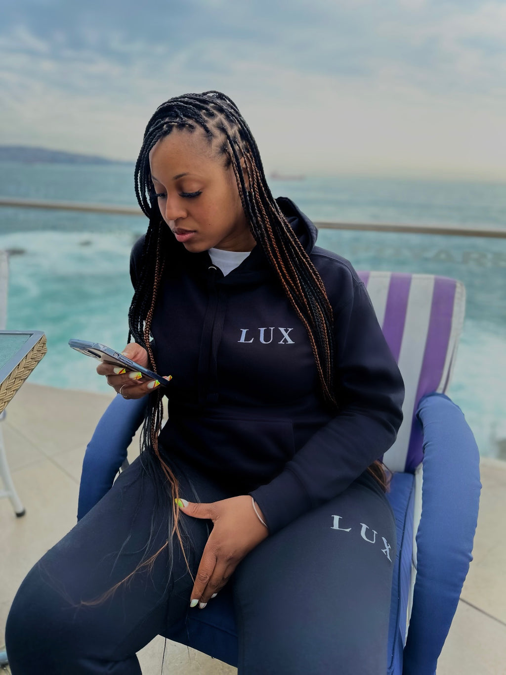 Black LUX Classic Hoodie worn on model front view