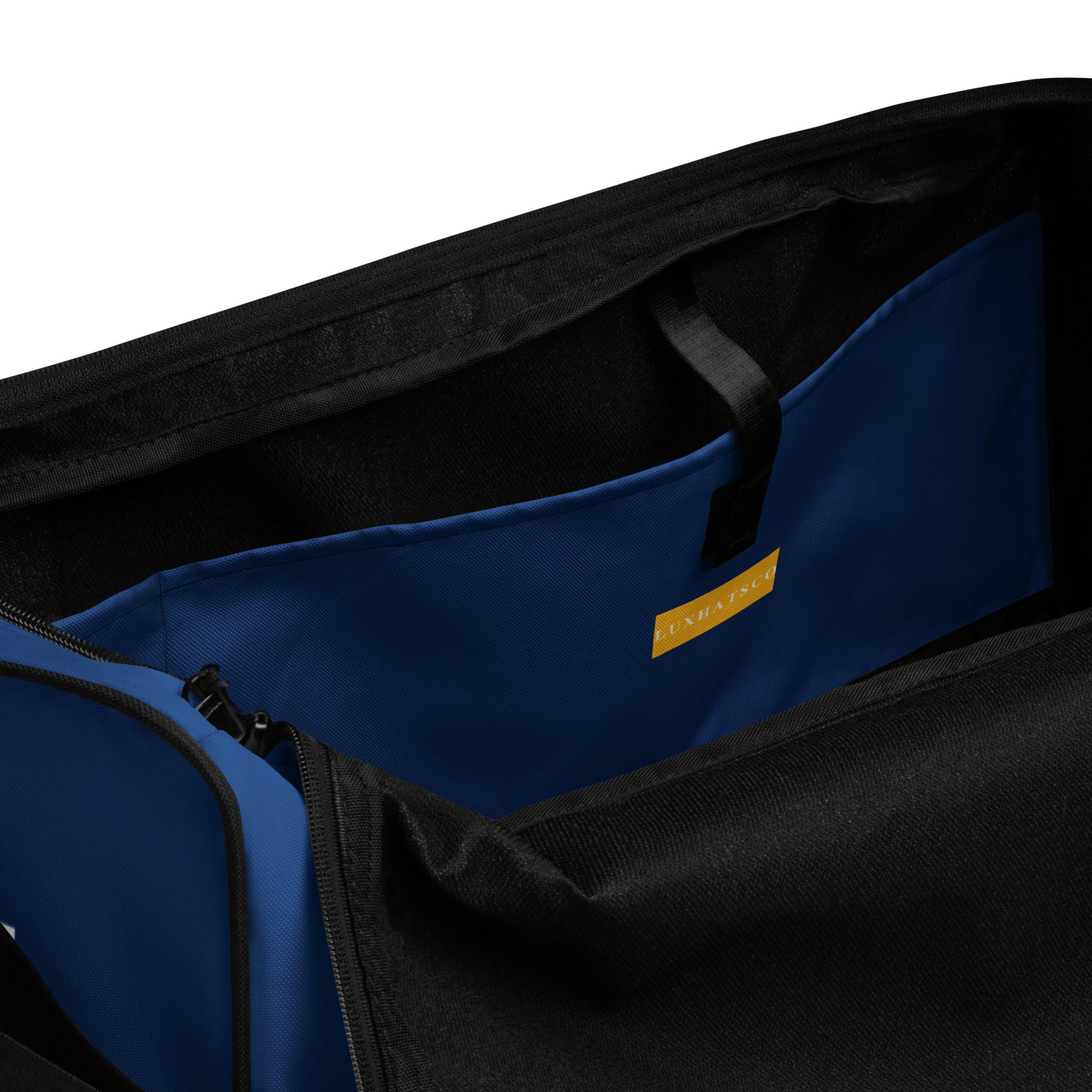Navy LUX Duffle Bag interior view with multiple pockets