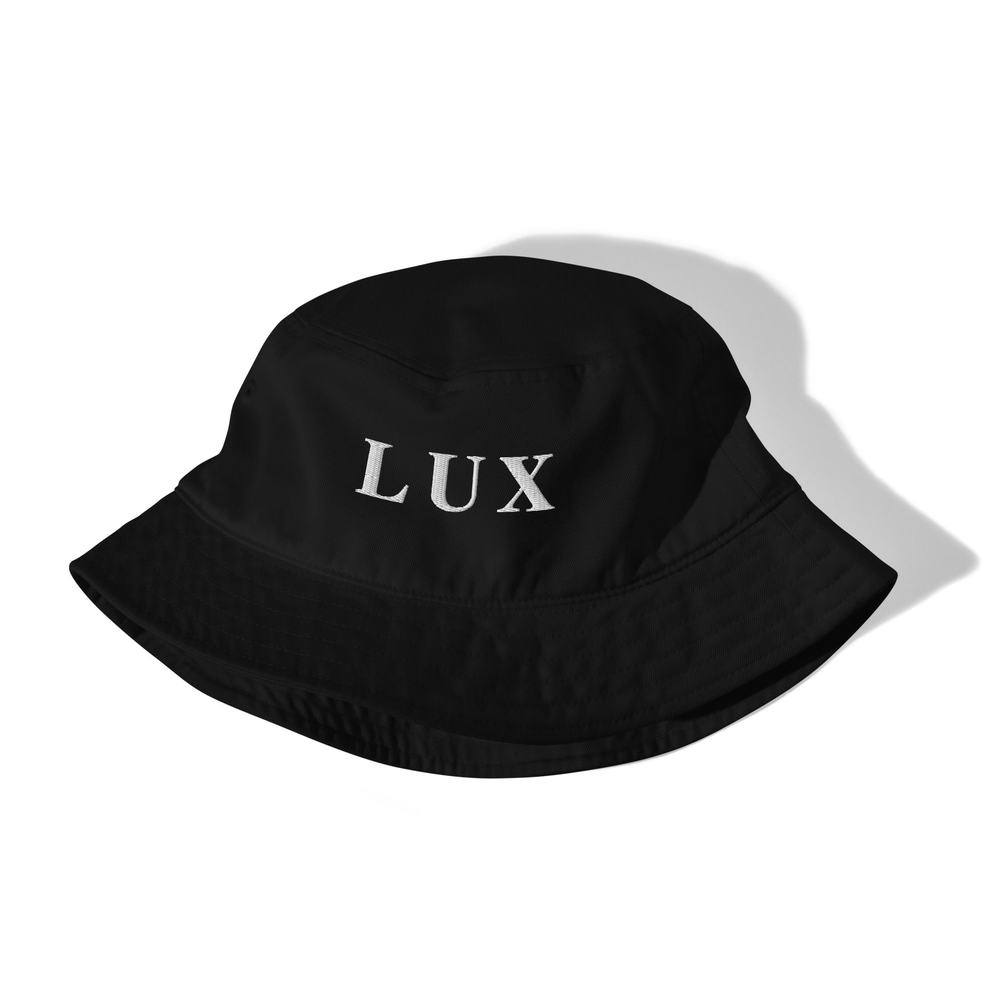 Side view of black LUX bucket hat showing premium stitching and structured shape