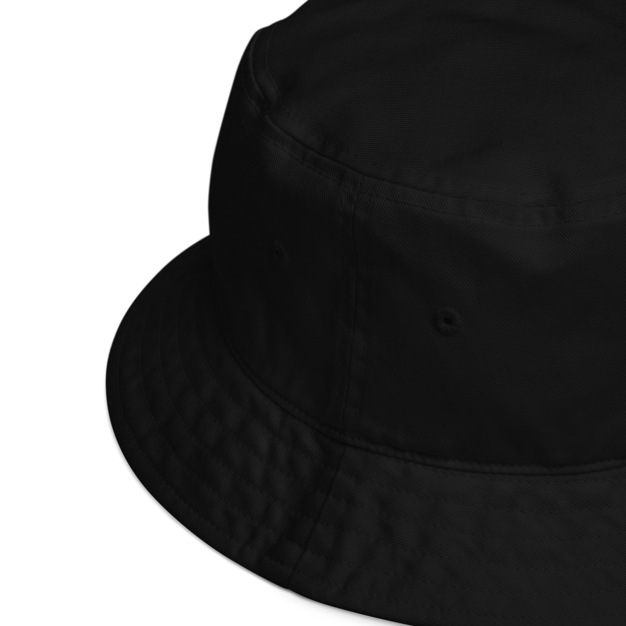 Angled view of black LUX streetwear bucket hat highlighting soft breathable cotton